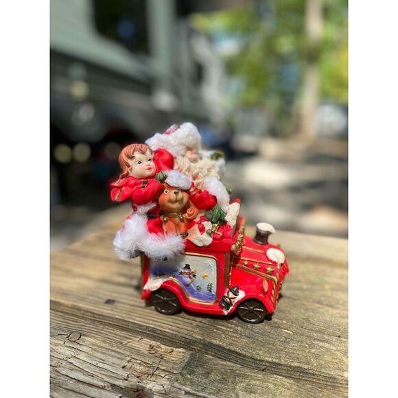 Santa Claus his helpers toys in a car￼ - Picture 10 of 16